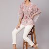 A Peach Geometric Printed Georgette Kaftan Top With Off White Cotton Pants