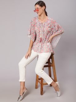 A Peach Geometric Printed Georgette Kaftan Top With Off White Cotton Pants