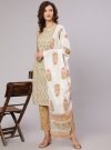 A Green Straight Ethnic Printed Gota Embellished Kurta With Printed Pants And Dupatta.