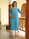 Turquoise Blue Ethnic Printed Straight Rayon Kurta With Embroidered Yoke And Cotton Pants