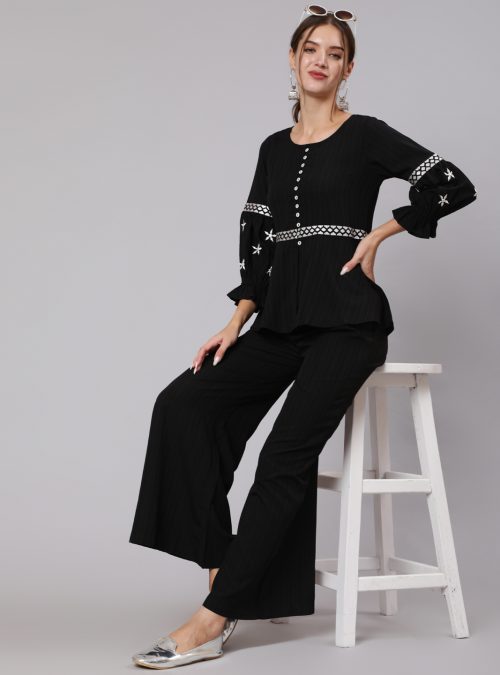 A Black Color Embroidered Lycra Georgette Co-Ords Set With Peplum Top And Palazzo