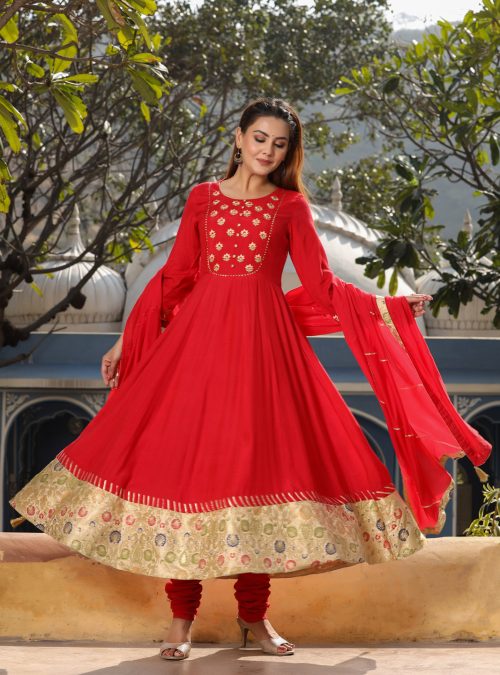 Amaiva Red Anarkali Kurta With Churidar And Dupatta.